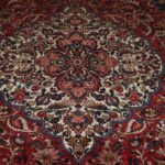 6'9'' X 10'5'' Persian Bakhtiari Medallion Semi-Antique Red Rectangle Wool Rug - Direct Rug Import | Rugs in Chicago, Indiana,South Bend,Granger