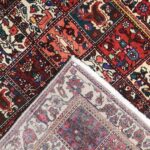4’11”x6’8” Persian Traditional Ivory Wool Hand-Knotted Rug - Image 4